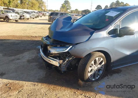 2025 Honda Odyssey Touring z USA, uszkodzony, nr VIN 5FNRL6H87SB051608